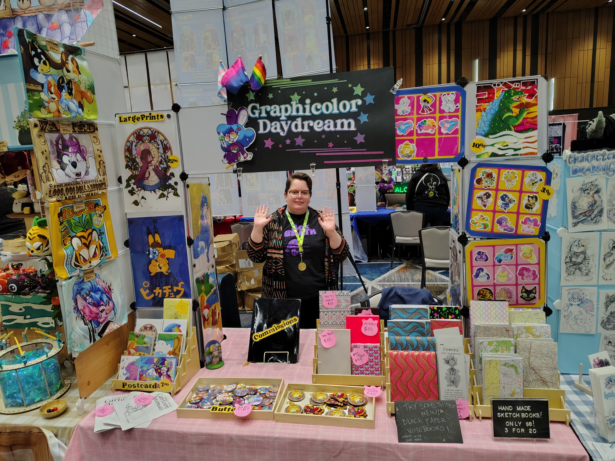 Photo of the Artist at their booth.